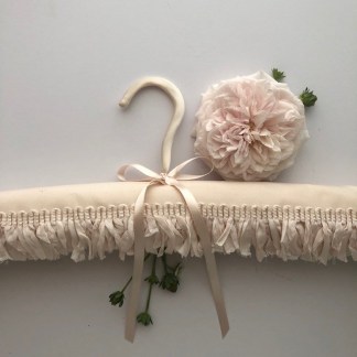 Blush taffeta coat hanger
